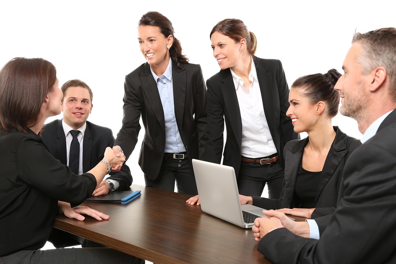 Women greetings in a meeting